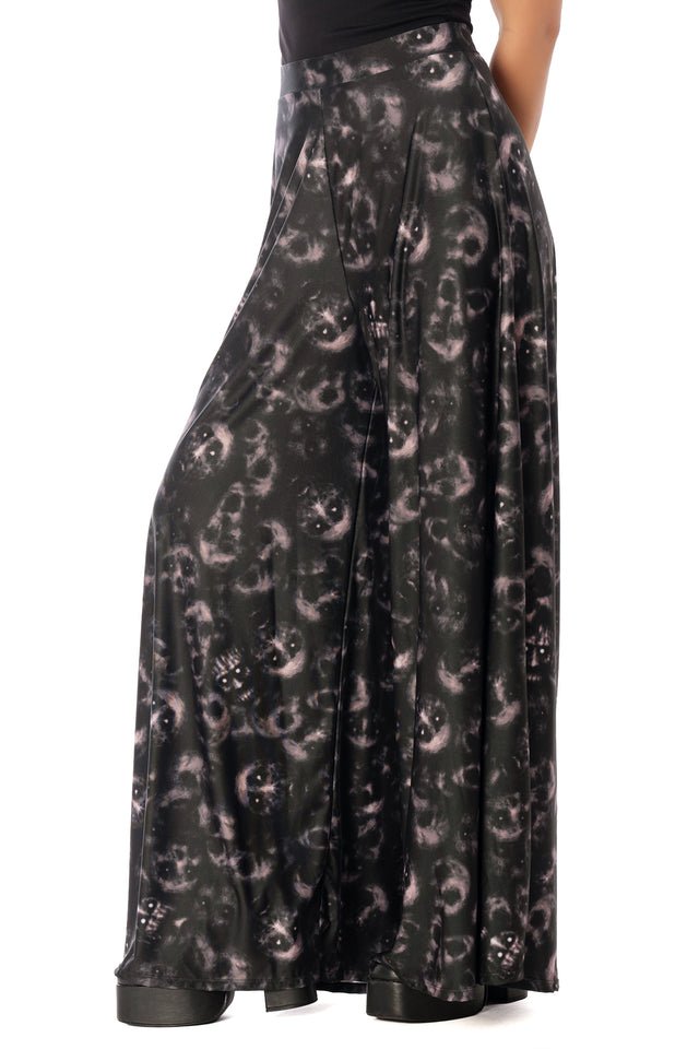 BlackMilk Horror Bound Palazzo Pants – grey trapped-souls print high-waisted wide-leg Halloween palazzo pants, part of the BlackMilk Clothing Halloween collection
