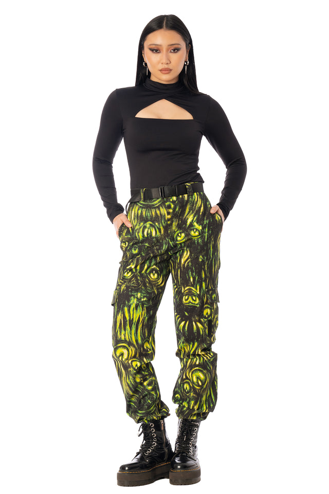 BlackMilk Mesmereyes Cargo Pants – green hypnotic eyeball print cotton cargo Halloween pants with vegan leather trims, part of the BlackMilk Clothing Halloween collection