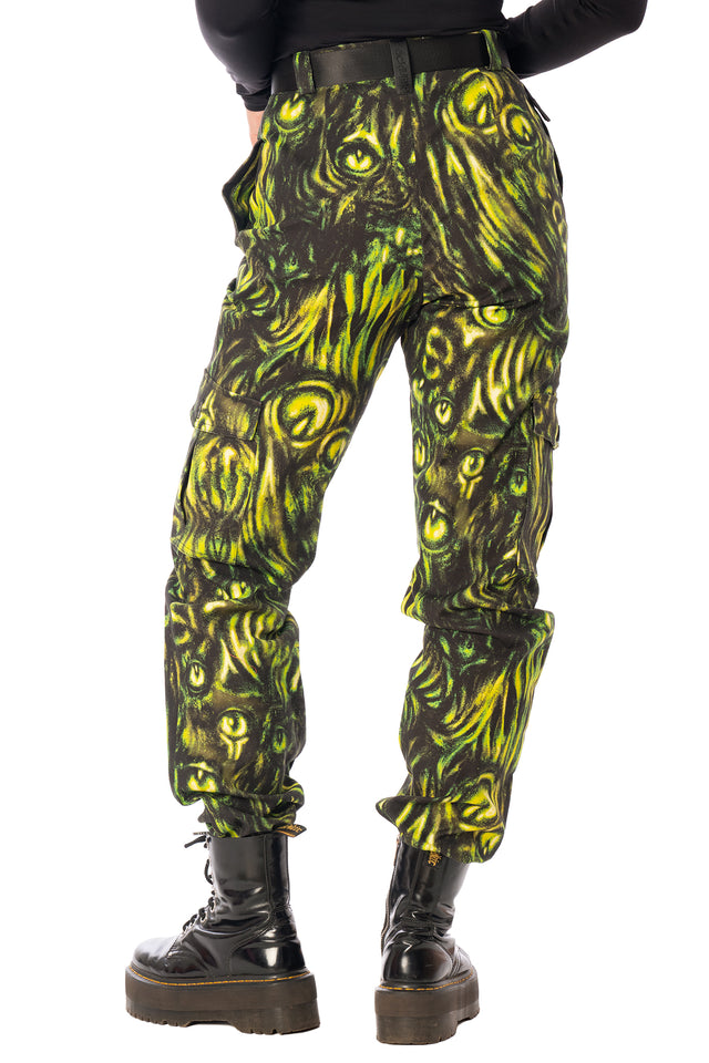 BlackMilk Mesmereyes Cargo Pants – green hypnotic eyeball print cotton cargo Halloween pants with vegan leather trims, part of the BlackMilk Clothing Halloween collection