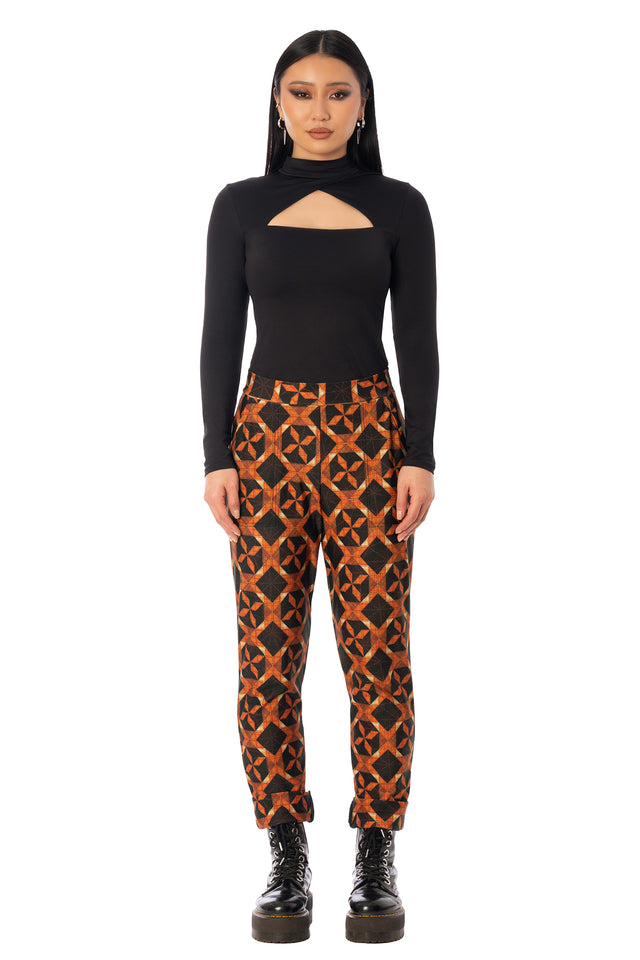 BlackMilk Pumpkin Patchwork Cuffed Pants – orange pumpkin and slasher print cuffed Halloween pants, part of the BlackMilk Clothing Halloween collection