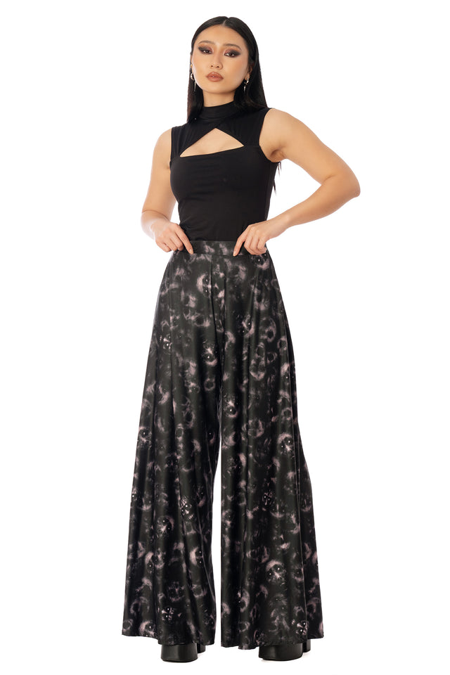 BlackMilk Horror Bound Palazzo Pants – grey trapped-souls print high-waisted wide-leg Halloween palazzo pants, part of the BlackMilk Clothing Halloween collection