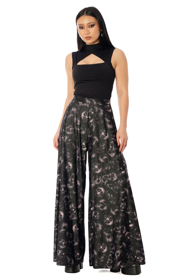 BlackMilk Horror Bound Palazzo Pants – grey trapped-souls print high-waisted wide-leg Halloween palazzo pants, part of the BlackMilk Clothing Halloween collection