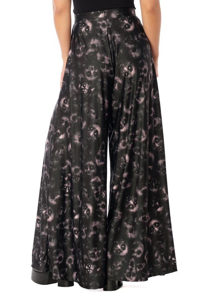 BlackMilk Horror Bound Palazzo Pants – grey trapped-souls print high-waisted wide-leg Halloween palazzo pants, part of the BlackMilk Clothing Halloween collection