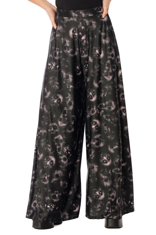 BlackMilk Horror Bound Palazzo Pants – grey trapped-souls print high-waisted wide-leg Halloween palazzo pants, part of the BlackMilk Clothing Halloween collection