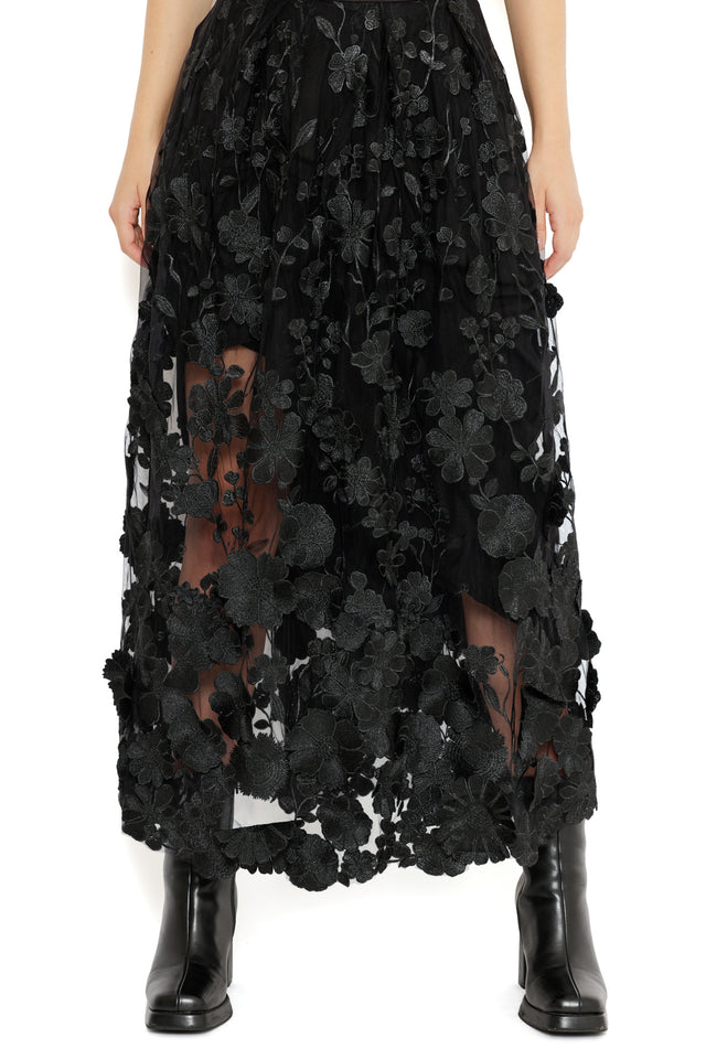 Model styled in the Altered Colour Lace Maxi Skirt, highlighting the gothic floral lace fabric, sheer texture and elegant maxi silhouette