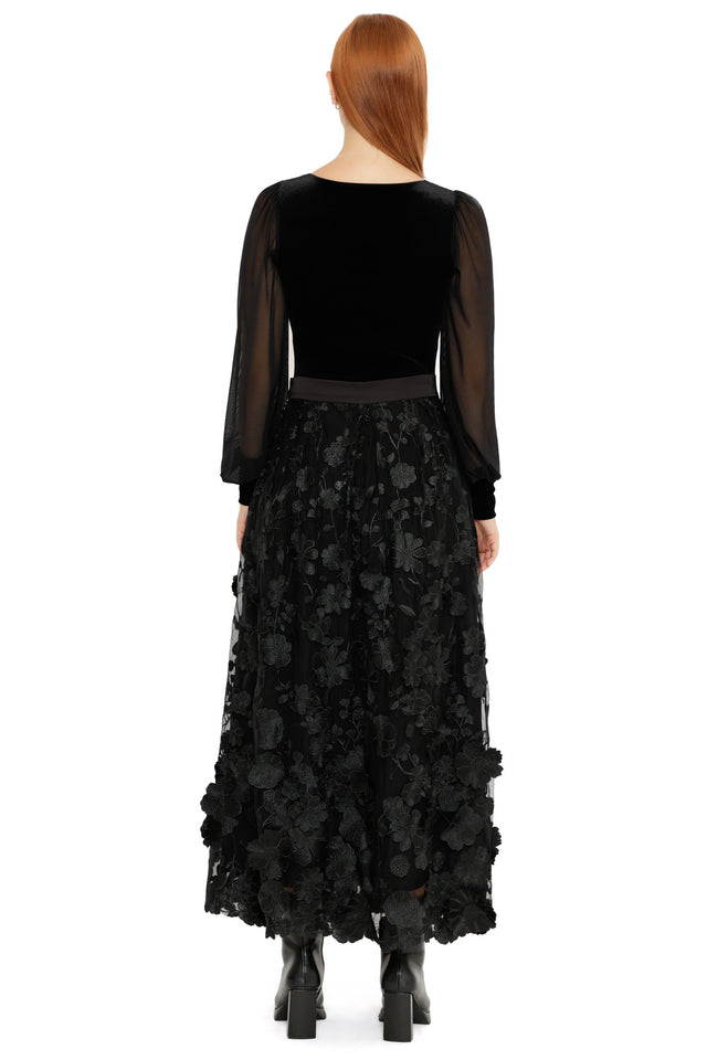 Front view of the Altered Colour Lace Maxi Skirt, showcasing black sheer lace with floral texture and a soft flowing maxi length