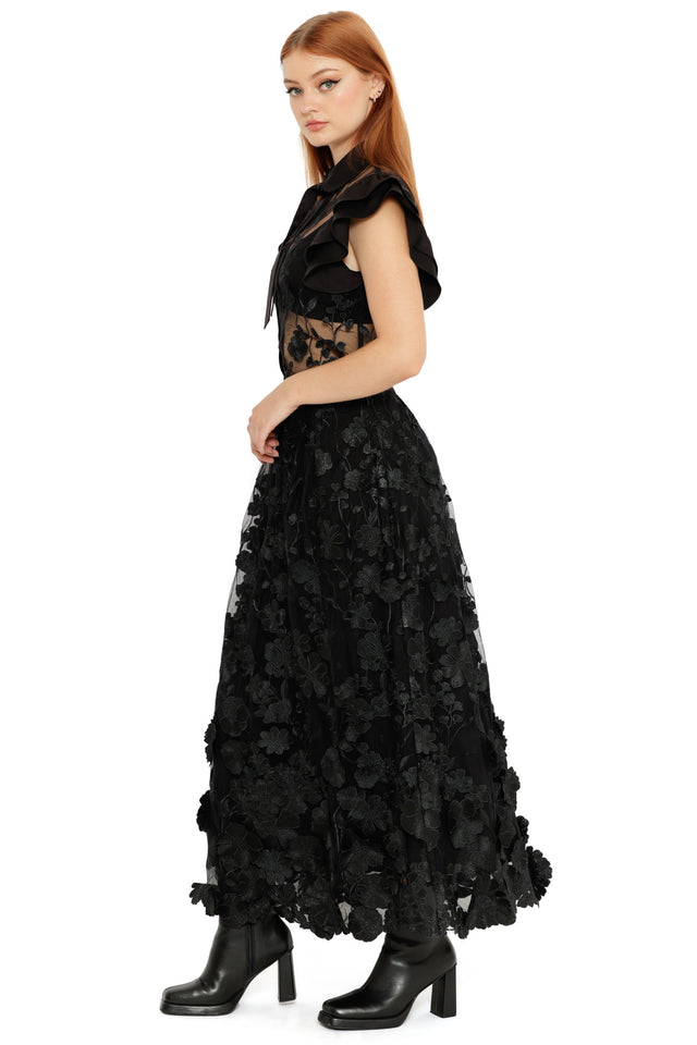 Altered Colour Lace Maxi Skirt styled with boots, a gothic black maxi skirt with sheer lace layers and dimensional floral detailing