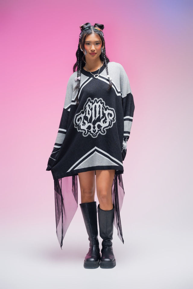 Oversized black hockey jersey featuring bold BlackMilk branding, broken heart sleeve graphics, contrast athletic stripes and a relaxed V-neck silhouette for alternative streetwear.