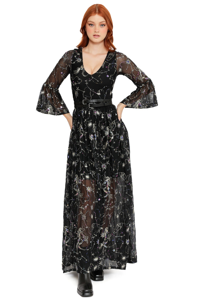 Sheer black celestial maxi dress with constellation embroidery, flared sleeves and a flowing skirt