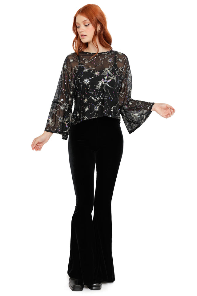 Sheer black long sleeve top with celestial constellation embroidery, featuring stars, moons and cosmic linework