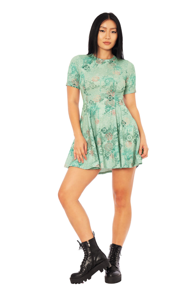 Close up of Avatar: The Last Airbender x BlackMilk No War in Ba Sing Se Evil Tee Dress, showcasing Earth Kingdom inspired artwork and Ba Sing Se pattern details