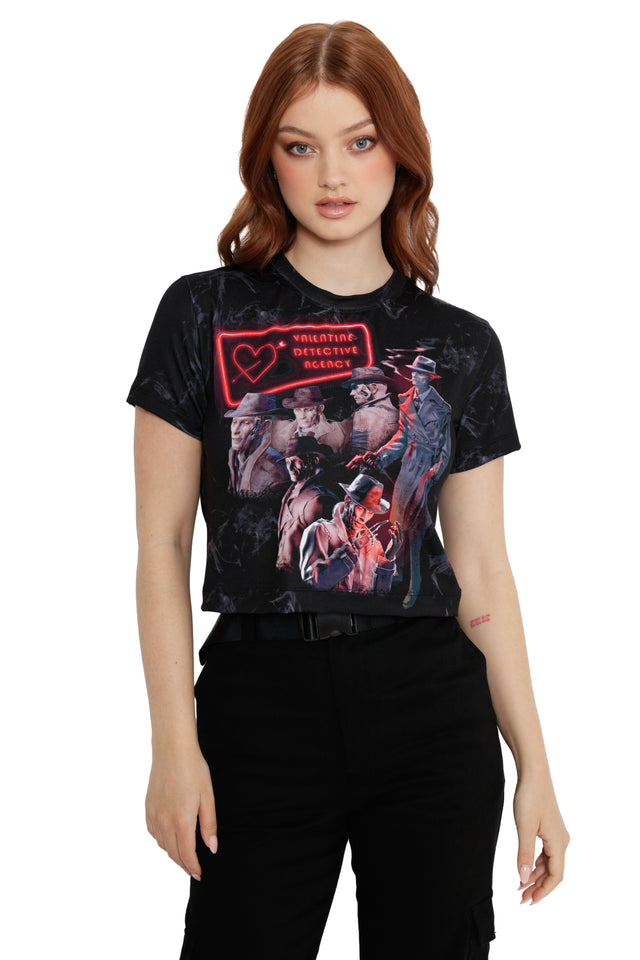 Model wearing Fallout x BlackMilk Be My Valentine cropped tee featuring bold Valentine Detective Agency Fallout print.