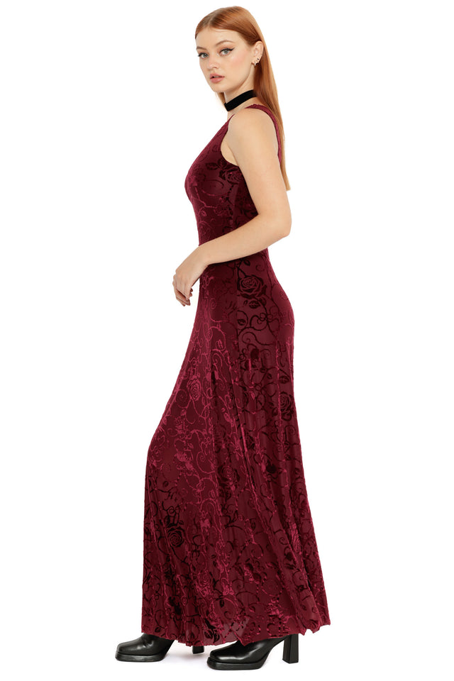 Front detail of the Be With Me Always Black Cherry Burned Velvet Princess Maxi Dress from the Wuthering Heights collection, highlighting the rich cherry toned velvet texture and romantic princess cut