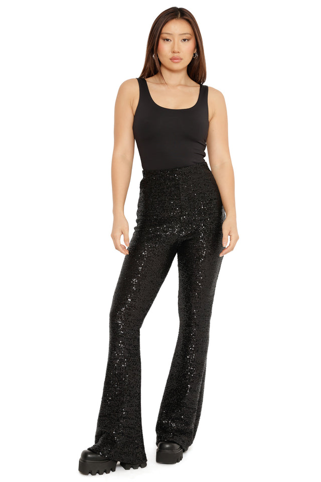 black sequin flare pants christmas party outfit idea