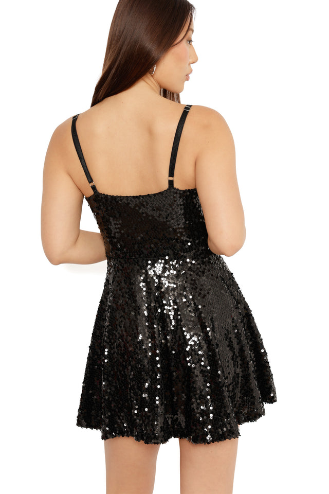 glittery black skater dress perfect for christmas celebrations