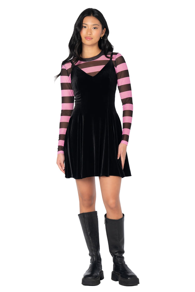 Lightweight striped mesh top with pink and black design, sheer finish and fitted silhouette that pairs perfectly with cargo pants, skirts and statement accessories.