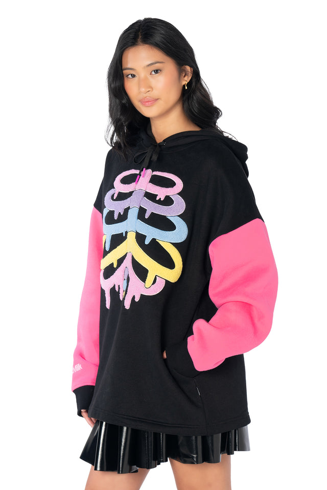 Heavyweight oversized hoodie featuring a playful rainbow skeleton print, contrast pink sleeves, fully lined hood and soft fleece fabric for everyday comfort.