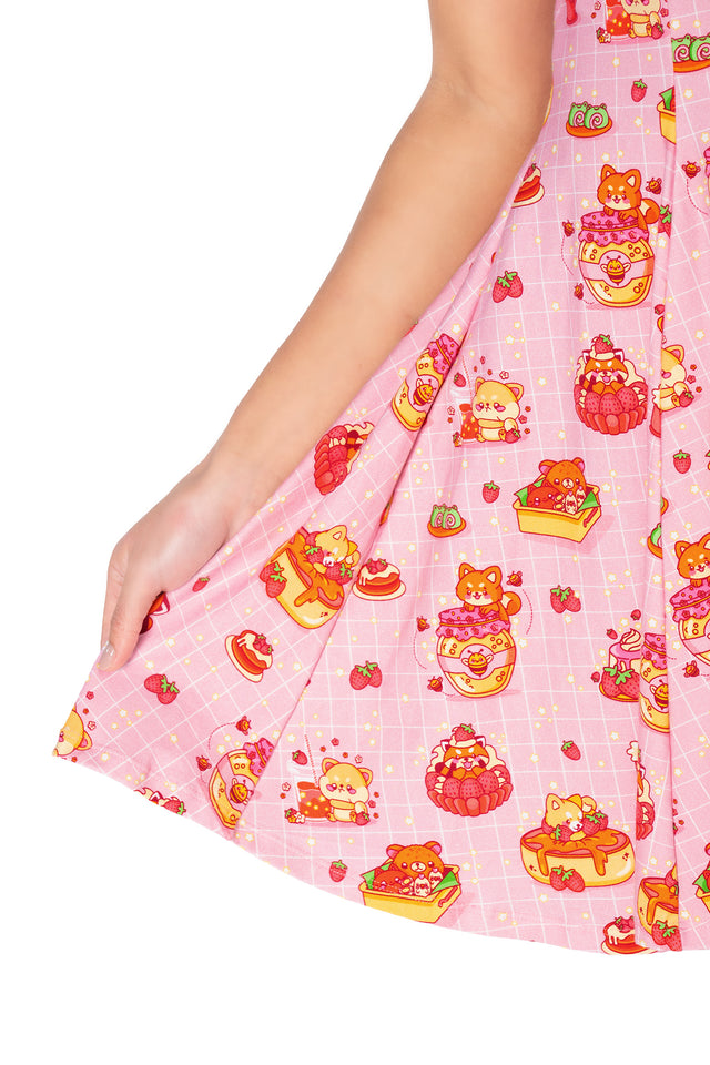 Pastel animal print skater dress with adorable raccoons, shibas, red pandas and sweet treat illustrations, designed with a fitted bodice and casual mini tee dress shape.