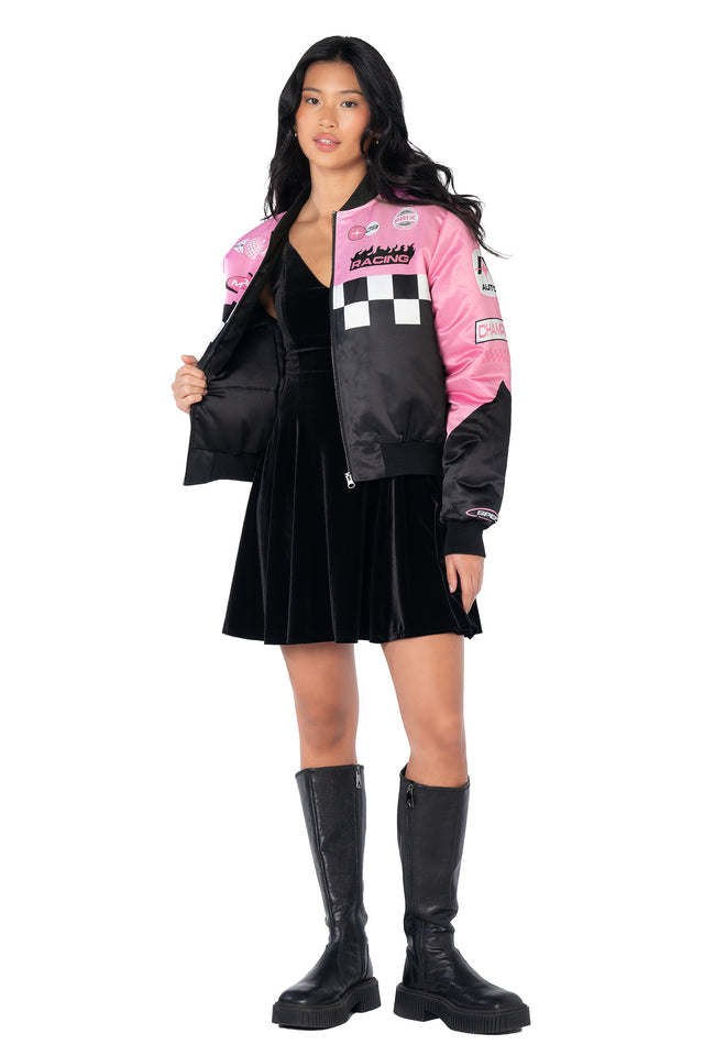 Relaxed fit racing jacket inspired by classic NASCAR styles, featuring holographic patches, sporty stripe details, statement back artwork and easy layering design.