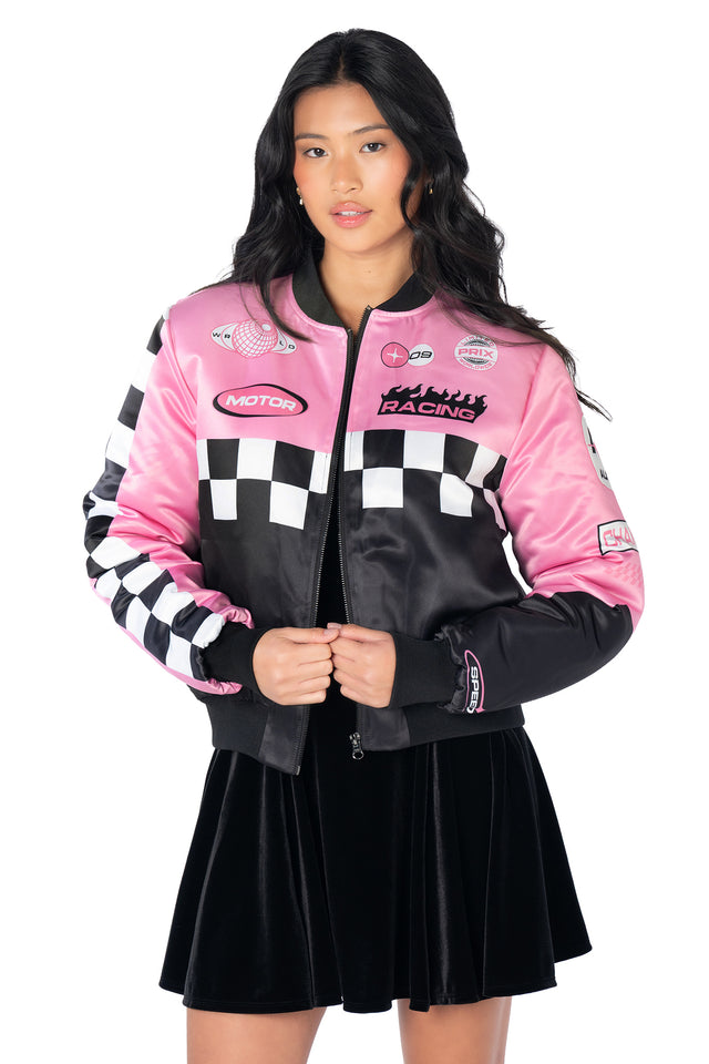 BlackMilk BMR racing jacket featuring holographic racing patches, relaxed NASCAR-inspired silhouette, zip front, statement back print and practical side pockets.
