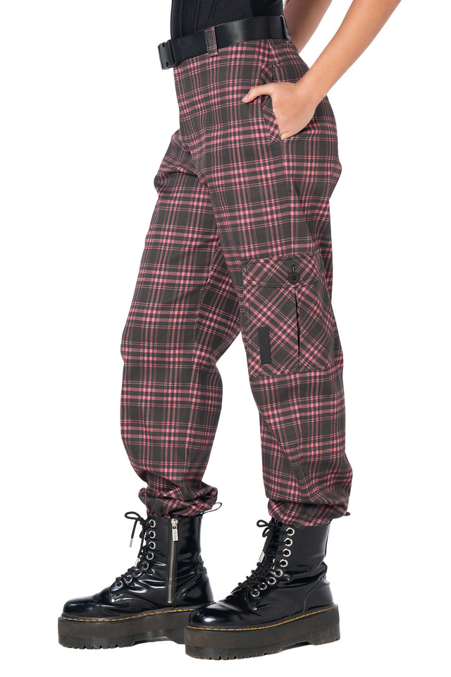 Pink plaid cargo pants with oversized utility pockets, adjustable buckle belt, zip fly closure and relaxed fit, perfect for alternative fashion, Y2K streetwear and casual everyday outfits.
