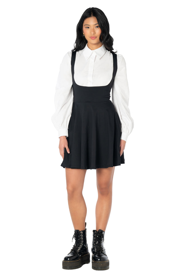 Elegant white button-up blouse with a removable oversized bow, dramatic long sleeves and lightweight woven fabric for timeless feminine dressing and special occasions.