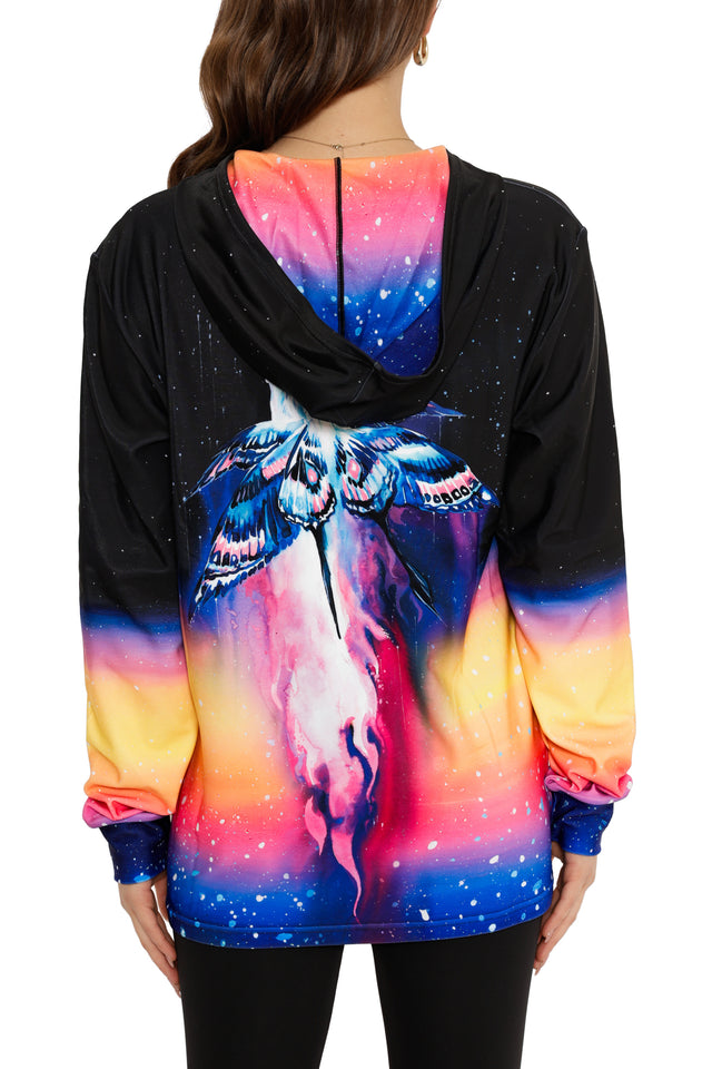 Colorful hoodie with a butterfly design on the back, worn by a person.