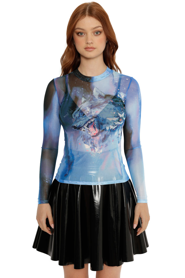 Woman wearing a blue and black outfit with a graphic design on a white background