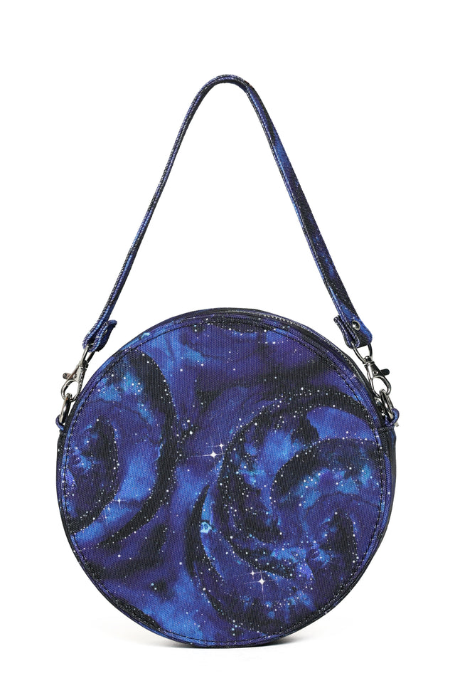 Round blue and black patterned handbag on a white background