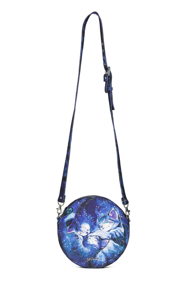 Crossbody bag with cat design on a white background