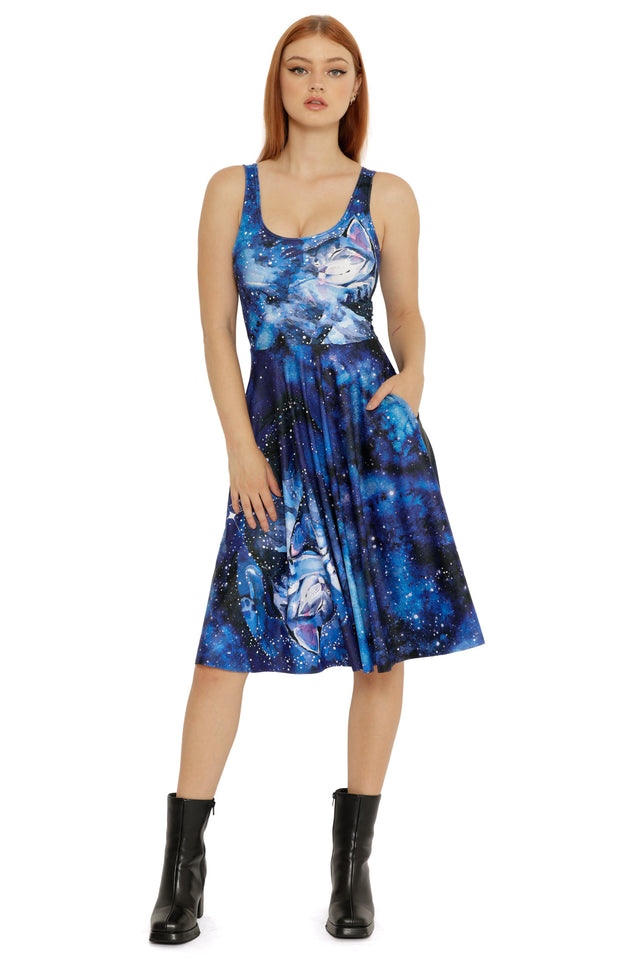 Front view of the Celestial Cuddling Scoop Midi Dress from the Lora Zombie collection, featuring a deep blue cosmic print with illustrated figures.
