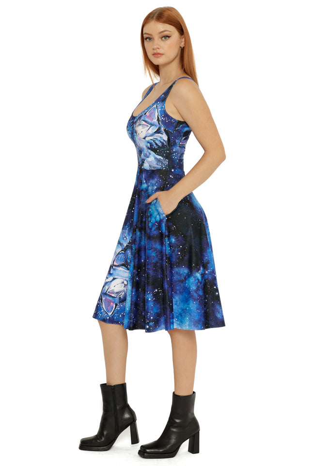 Celestial Cuddling Scoop Midi Dress worn full length, highlighting the galaxy-inspired print and fluid movement through the skirt.