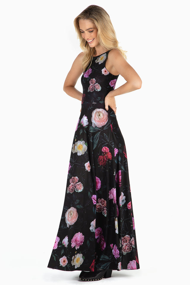 Model wearing Dark Rose Princess Maxi Dress by BlackMilk Clothing, black floral maxi dress with dark rose print and flowing skirt