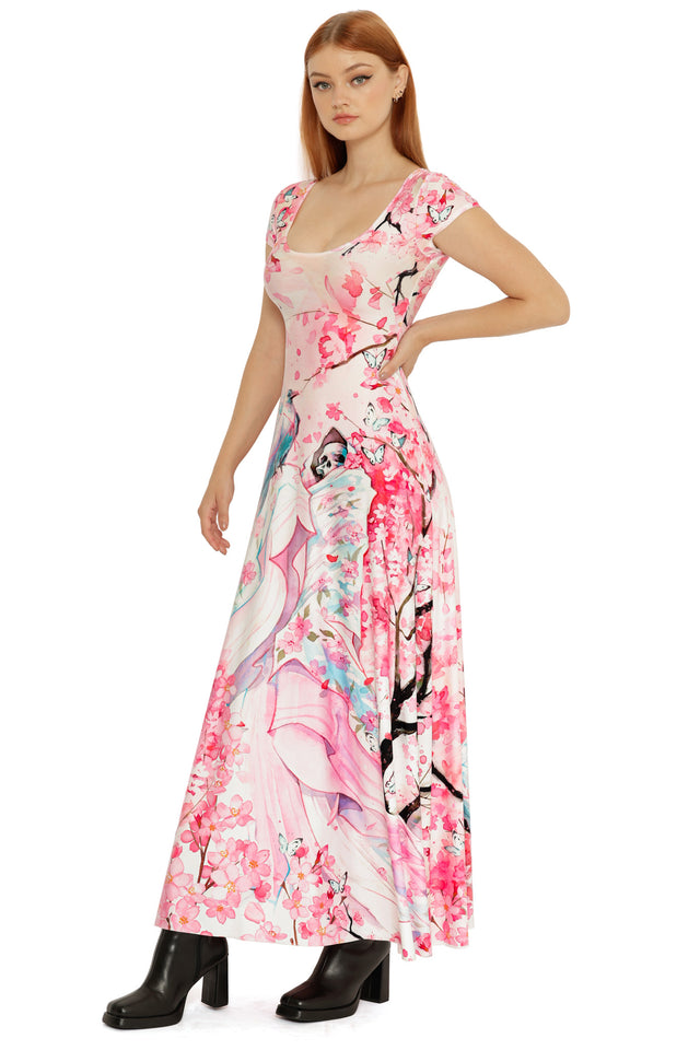 Long Lora Zombie illustrated dress with cap sleeves, a scoop neckline, and an expressive floral and character print across the skirt.