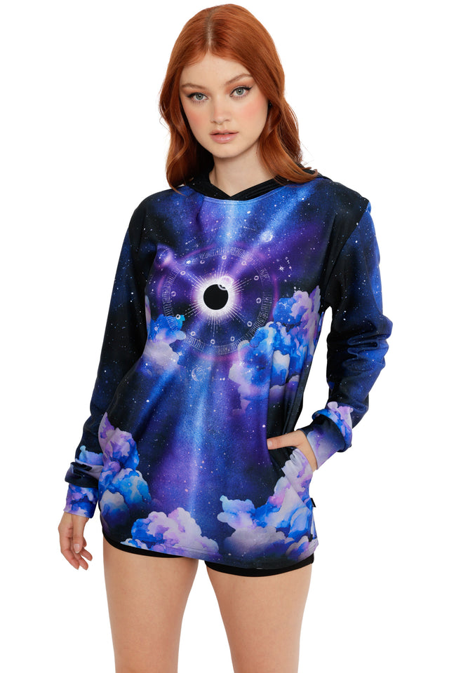 Long sleeve space hoodie top with deep blue and purple galaxy print featuring an eclipse-style moon and cloud details