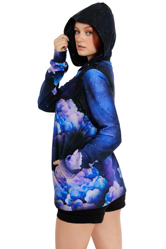Galaxy print hoodie featuring dark cosmic tones, glowing eclipse centre and soft nebula clouds