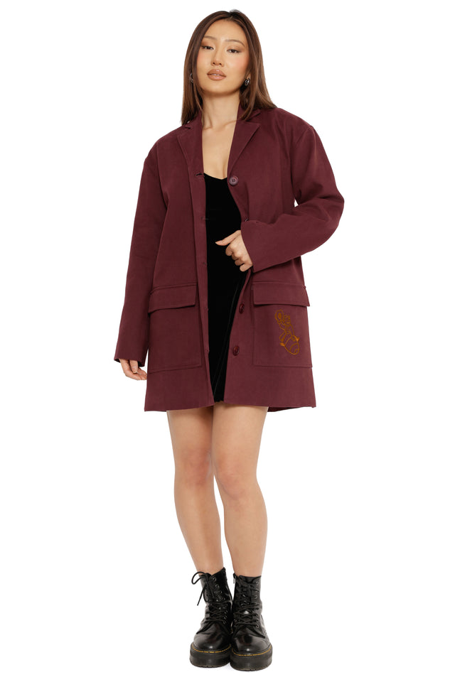 Fallout x BlackMilk burgundy duster jacket featuring embroidered Vault Boy holding a martini glass design.