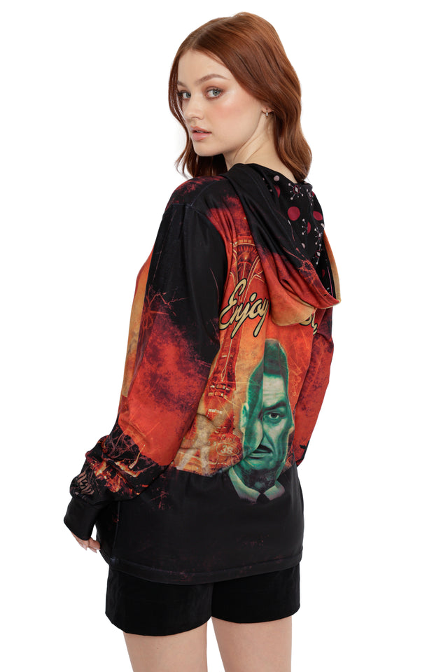 Model styled in Fallout x BlackMilk Enjoy Your Stay Hoodie featuring fiery red New Vegas skyline artwork.