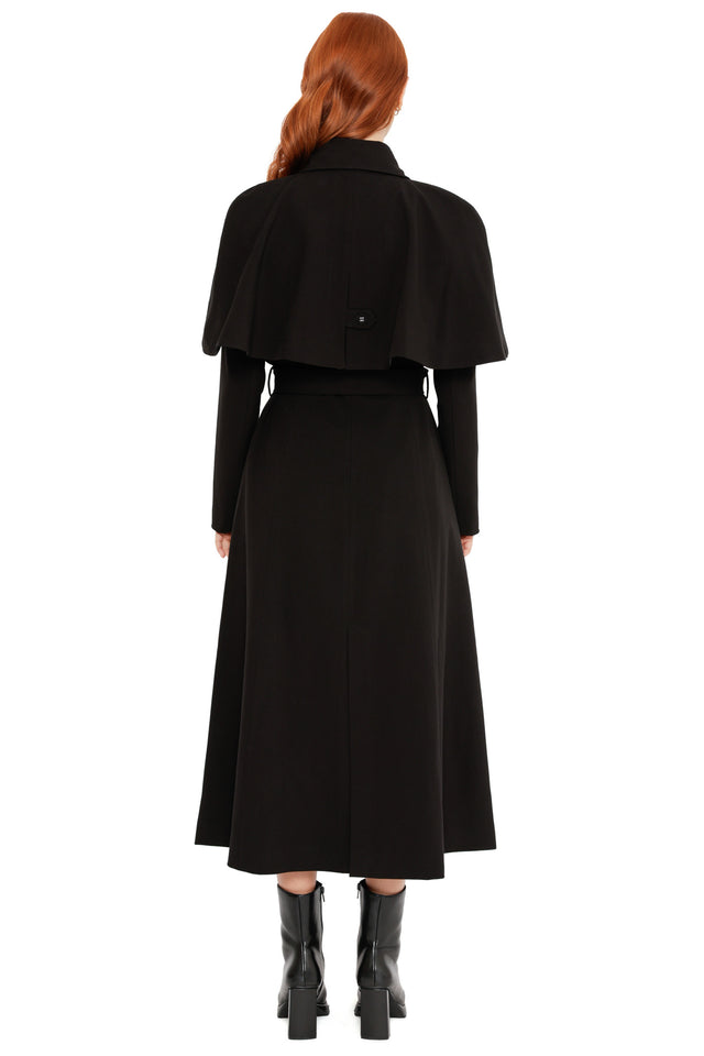 Heathcliff Trench Coat from the Wuthering Heights collection styled open, a gothic black 3 in 1 coat with lace lined interior, flowing hem and dramatic dark romantic silhouette