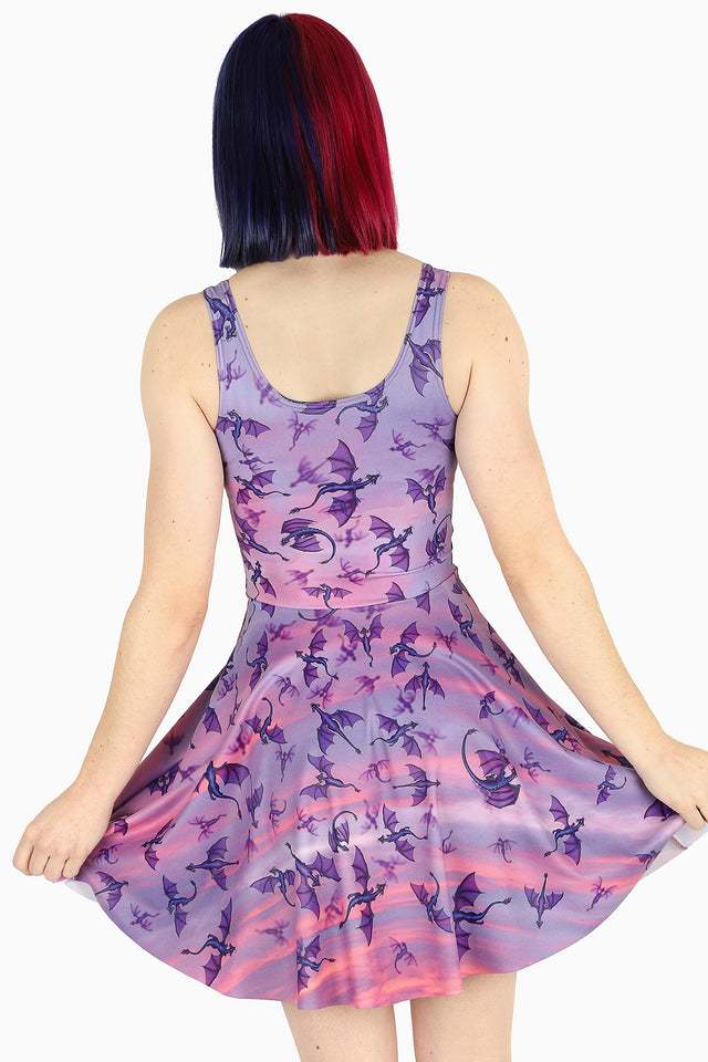 Purple skater dress with dragon print and sunset gradient tones, Here Be She Dragons Scoop Skater Dress from BlackMilk Clothing