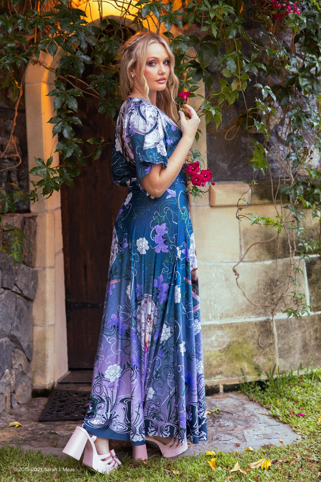 A Court of Thorns and Roses House of Archeron dress, ACOTAR inspired kimono maxi dress by Sarah J Maas with Feyre, Nesta and Elain print, floral details, wide sleeves and flowing silhouette