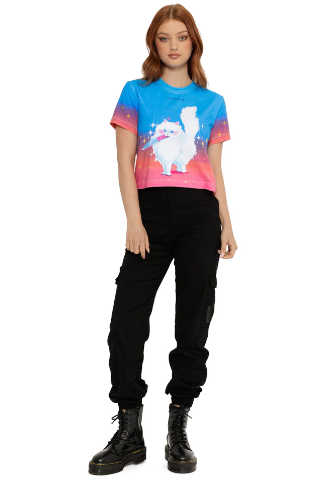 Person wearing a colorful t-shirt with a graphic design on a white background