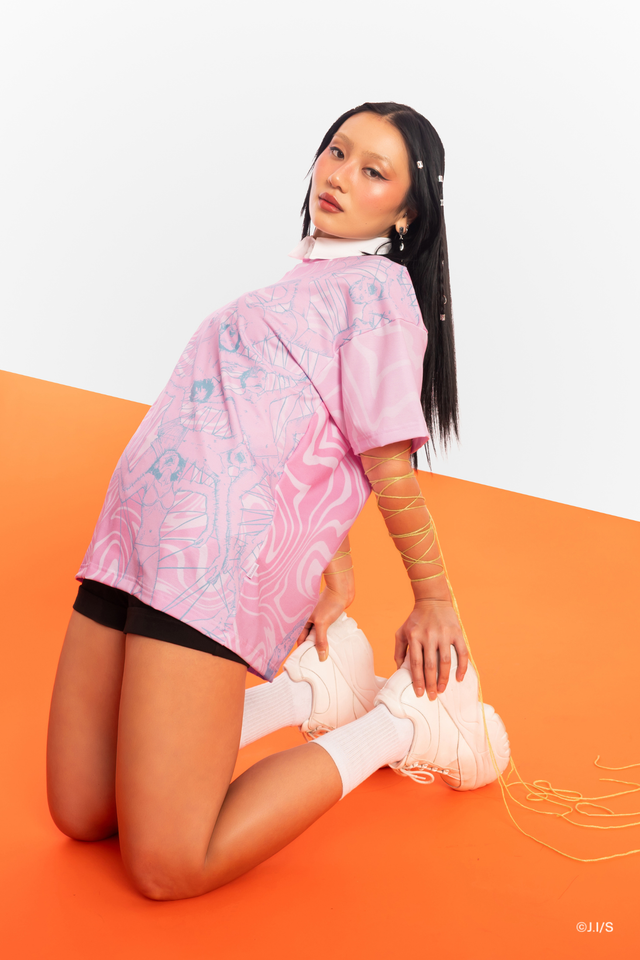 Junji Ito manga print Big Tee in soft pink tones, oversized unisex graphic t-shirt featuring Venus in the Blind Spot artwork.