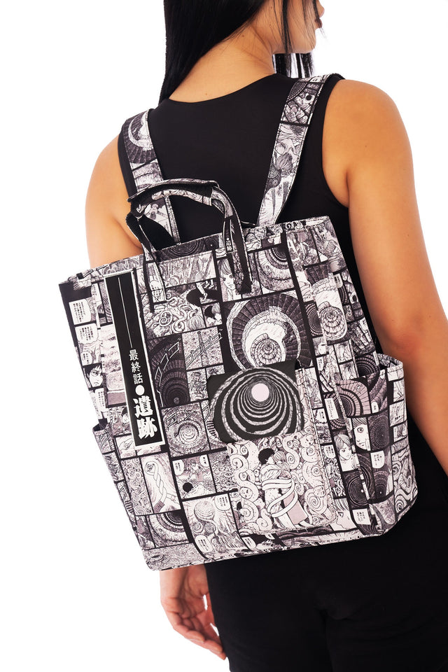 Junji Ito x BlackMilk Completion Comic Art satchel bag inspired by Uzumaki, structured black and white manga panel collage handbag in Japanese horror streetwear style.