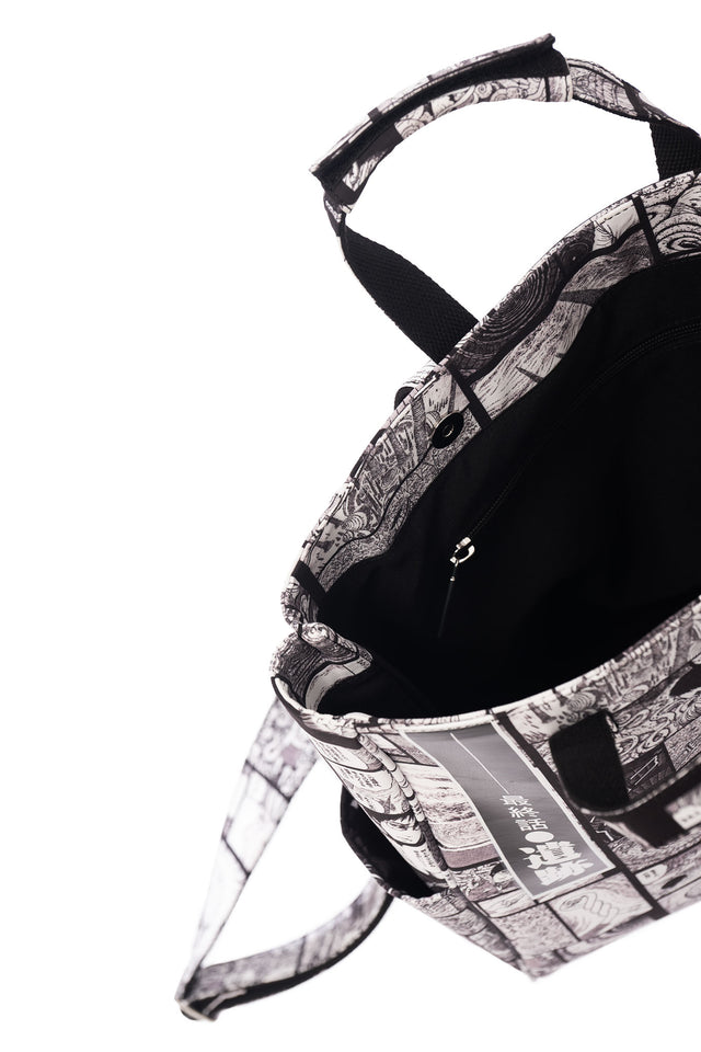 Junji Ito anime satchel bag featuring Completion Comic Uzumaki panels, structured black and white manga collage accessory in Japanese streetwear aesthetic.