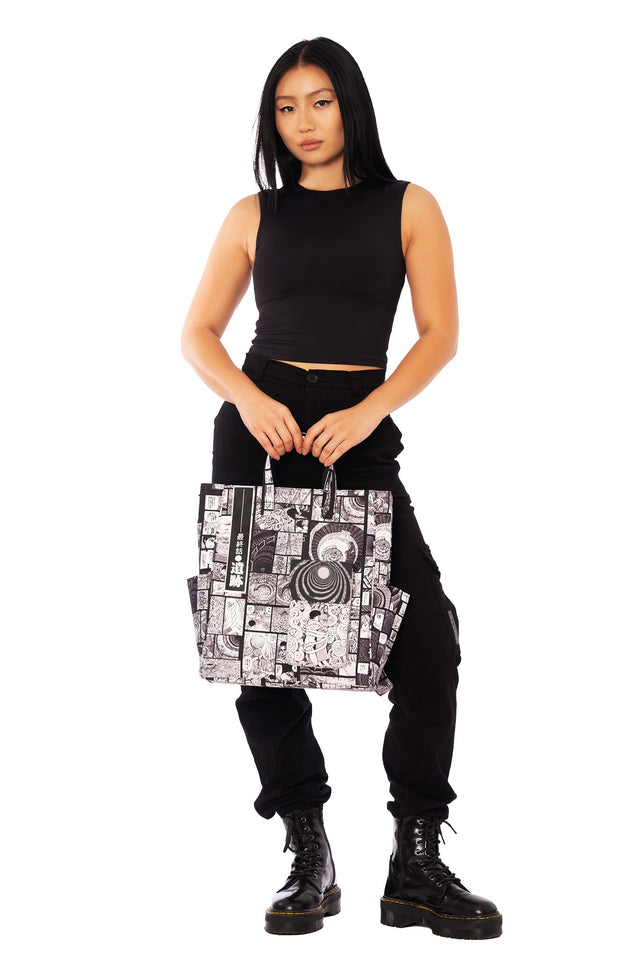 Uzumaki manga print satchel bag from the Junji Ito x BlackMilk collaboration, black and white comic panel tote with spiral artwork in alternative gothic fashion.
