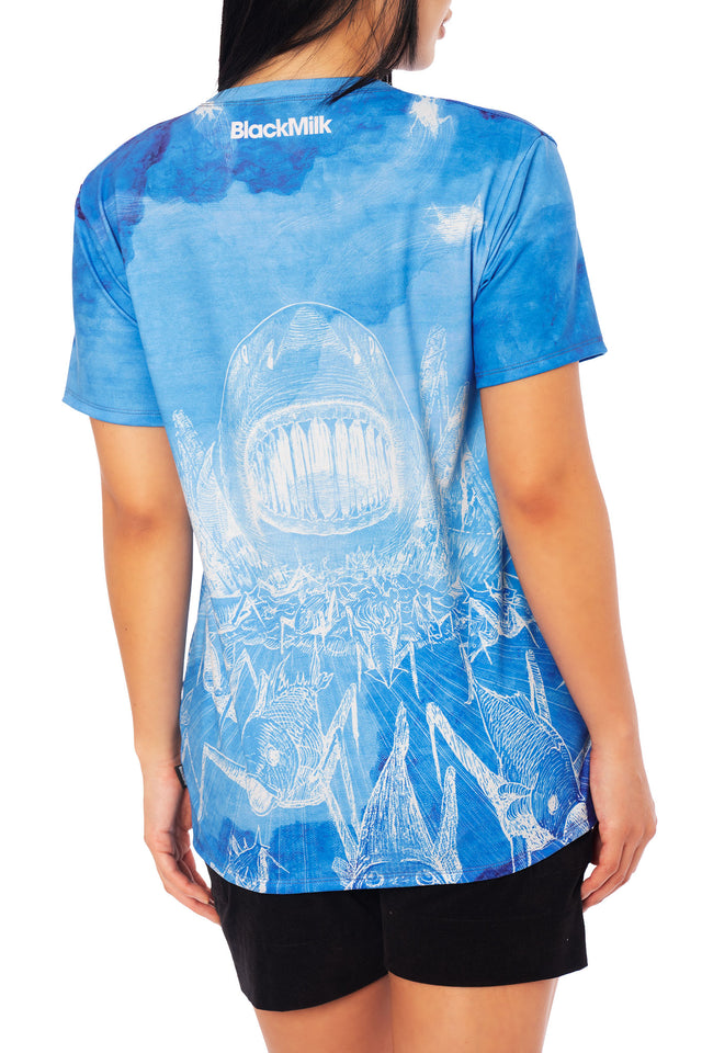 Gyo-inspired unisex boyfriend t-shirt from the Junji Ito x BlackMilk collaboration, relaxed fit anime tee with ocean blue gradient and mechanical sea creature print.