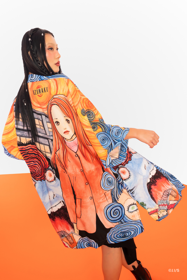 Uzumaki all-over print robe from Junji Ito x BlackMilk, flowing anime style outerwear with bold graphic artwork.
