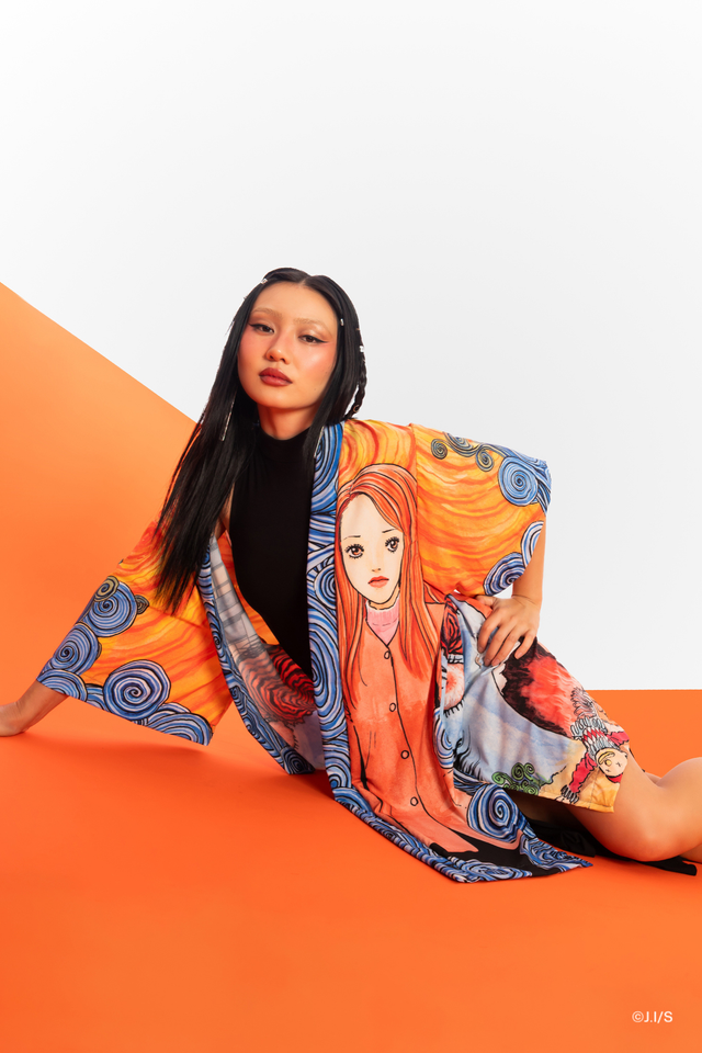 Junji Ito x BlackMilk Into Madness robe featuring all-over Uzumaki artwork, flowing manga print robe with Kirie Goshima and spiral design.