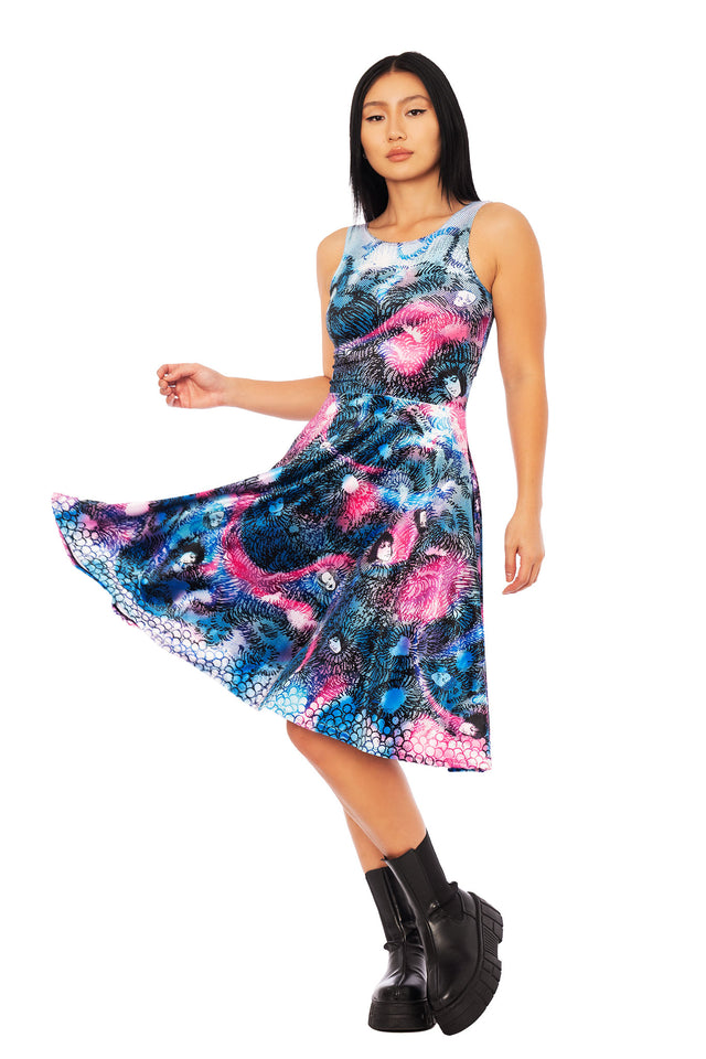 Junji Ito Black Paradox velvet midi dress in electric pink and mineral blue manga print, Japanese horror fashion with flared skirt silhouette.